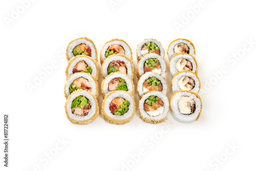 Assorted sushi rolls with tempura, salmon and eel on white
