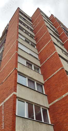 Red brick wall with windows