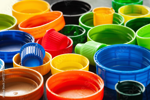 Plastic caps. Multi-colored plastic caps. Recycling of plastic. Selective focus