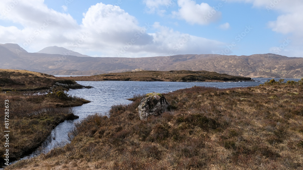 Stunning water view over Lewisian gneiss precambrian metamorphic rock landscape on Loch Inver, Assynt district of Sutherland in the highlands of Scotland UK Stunning water view over Lewisian gneiss precambrian metamorphic rock landscape on Loch Inver, Assynt district of Sutherland in the highlands of Scotland UK