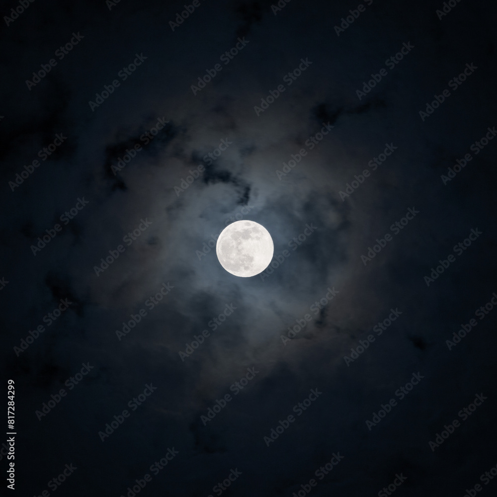 Full moon shining on cloudy Night sky background Full moon shining on cloudy Night sky background