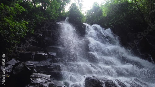 waterfall in green rainforest waterfall in the mountain jungle baliindonesia travel SBV 347407848 4K  photo