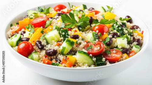 Quinoa salad with cherry tomatoes, cucumbers, bell peppers, black beans, and cilantro, on white background