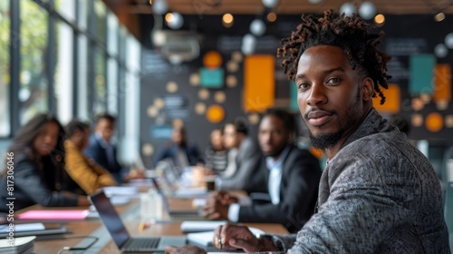 experienced black entrepreneur coaches diverse young professionals in a modern boardroom with tech gadgets, motivational quotes, focusing on leadership