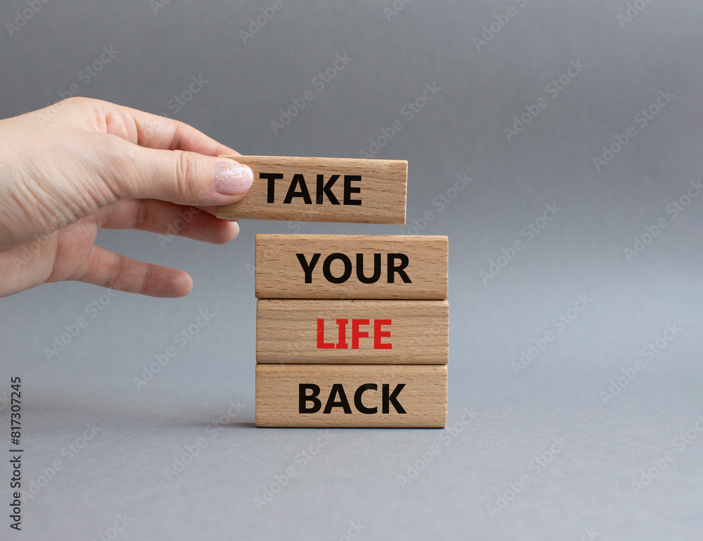 Take your life Back word symbol. Wooden blocks with words Take your life Back word. Psychologist hand. Beautiful grey background. Psychology and Take your life Back word. Copy space. Take your life Back word symbol. Wooden blocks with words Take your life Back word. Psychologist hand. Beautiful grey background. Psychology and Take your life Back word. Copy space.