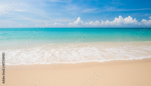 soft wave of blue ocean on sandy beach summer background