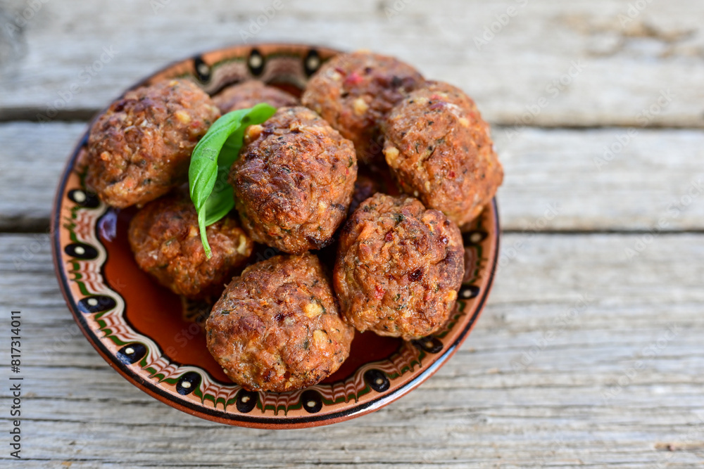 Home made Fried pork meatballs outdoor on wooden rustic background Home made Fried pork meatballs outdoor on wooden rustic background