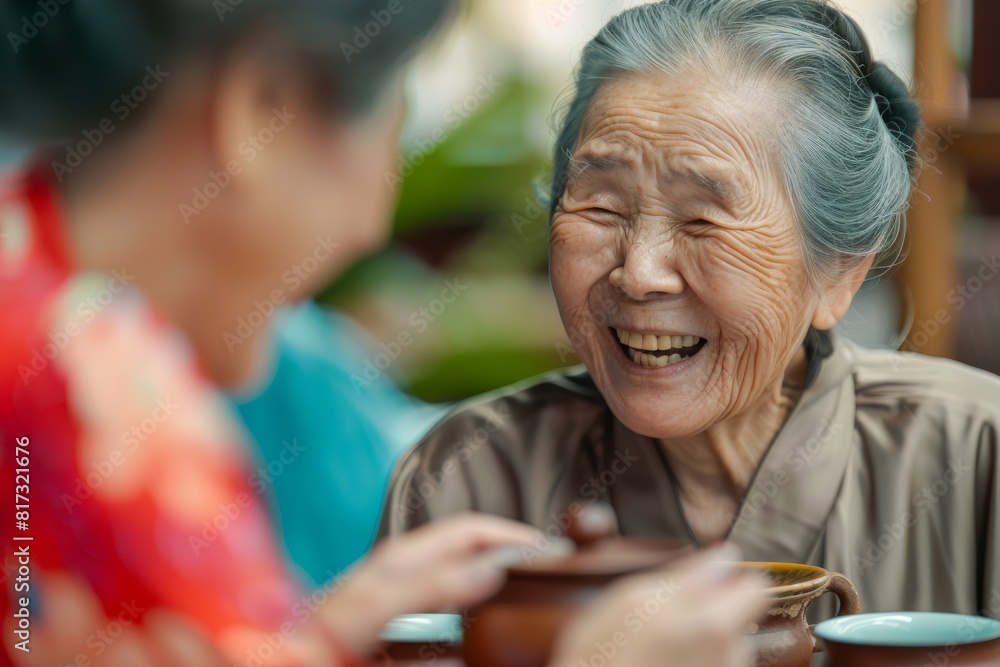 Two individuals partake in a thoughtful game of Go, a traditional board game Two individuals partake in a thoughtful game of Go, a traditional board game