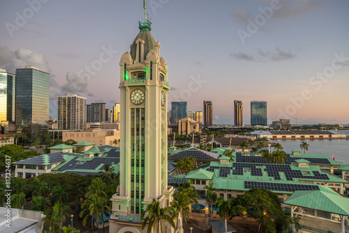 Exposure of the Aloha Tower at sunset, located on the Honolulu Harbor in Downtown Honolulu, about 15 minutes west of Waikiki, Aloha Tower is an iconic symbol of Hawaii. photo