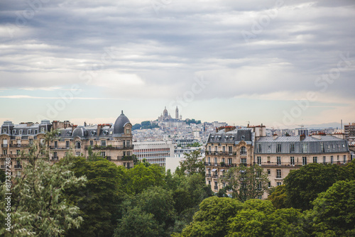 View of Montmartre from the Parc des Buttes Chaumont in Paris, France on an Overcast Day