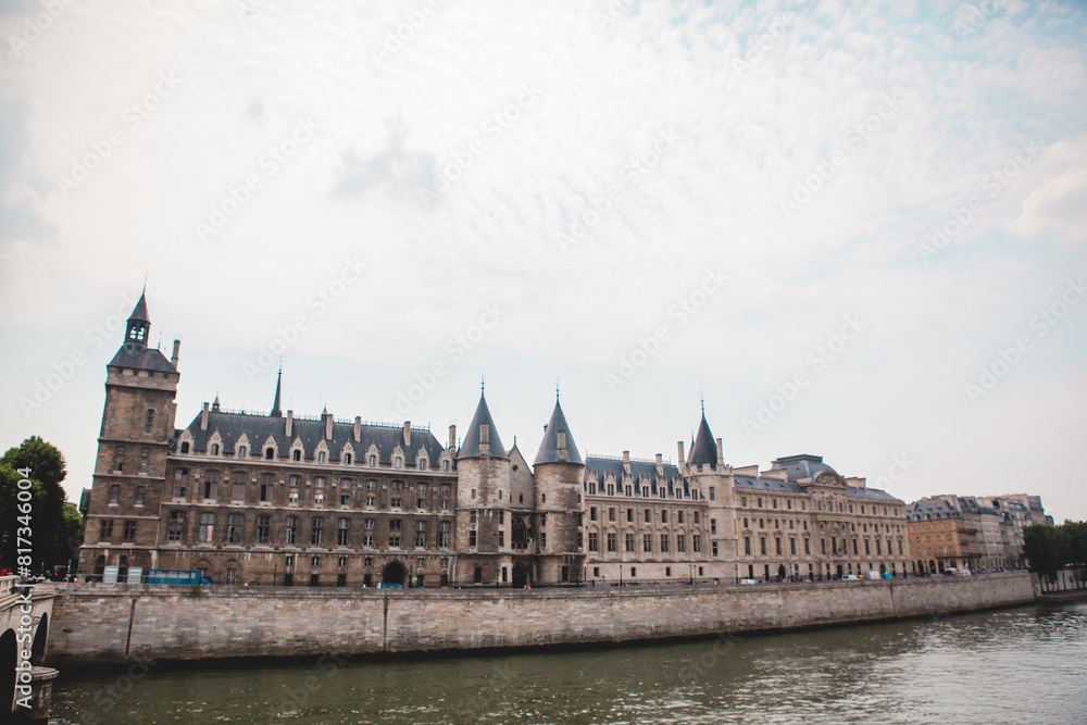 Fototapeta premium View of French Buildings Across the Seine River on a Beautiful Day in Paris, France 