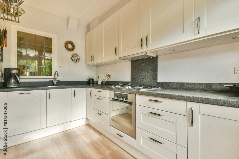 Modern kitchen interior with garden view Modern kitchen interior with garden view