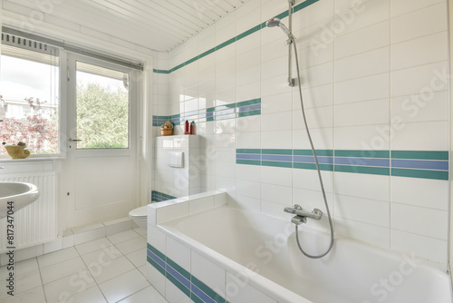 Fresh White Bathroom with Striped Tile Accents