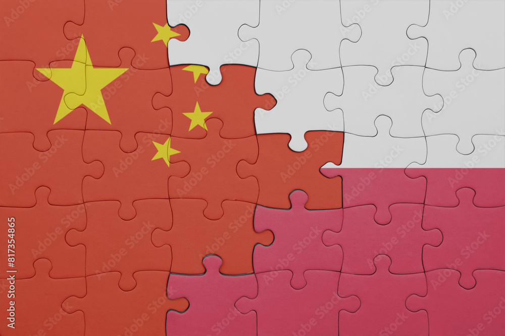 puzzle with the colourful national flag of poland and flag of china . puzzle with the colourful national flag of poland and flag of china .