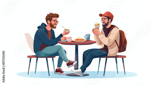 Two hipster guy sitting at table eating meal at foo photo