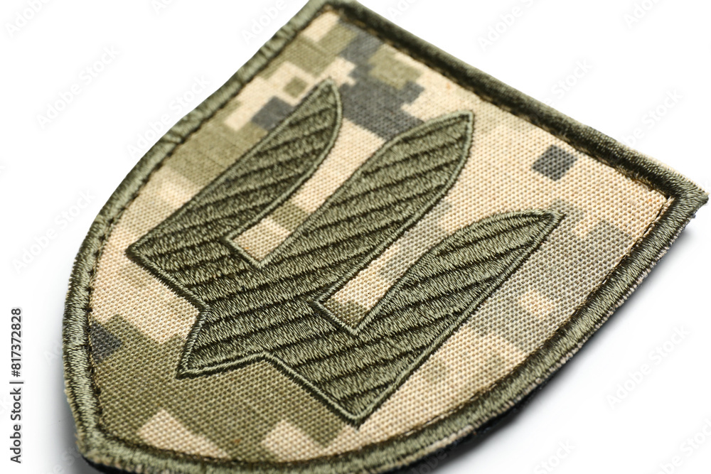 Military badge of Ukrainian army with trident isolated on white background Military badge of Ukrainian army with trident isolated on white background