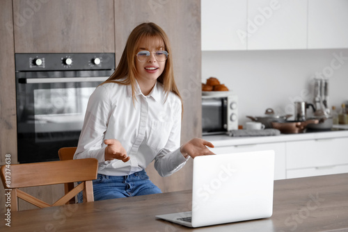 Teenage girl with laptop vi...