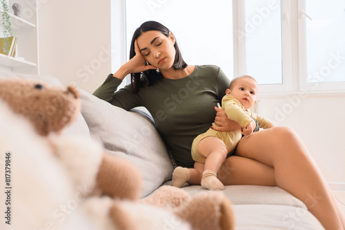 Young woman with her baby s...
