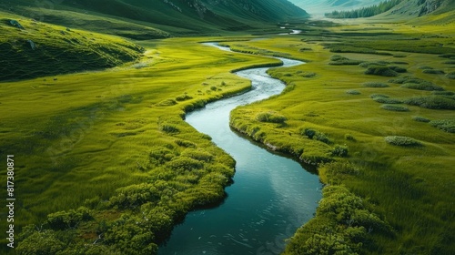 A winding river flowing through a lush green valley, reflecting the tranquility and serenity of inner peace.