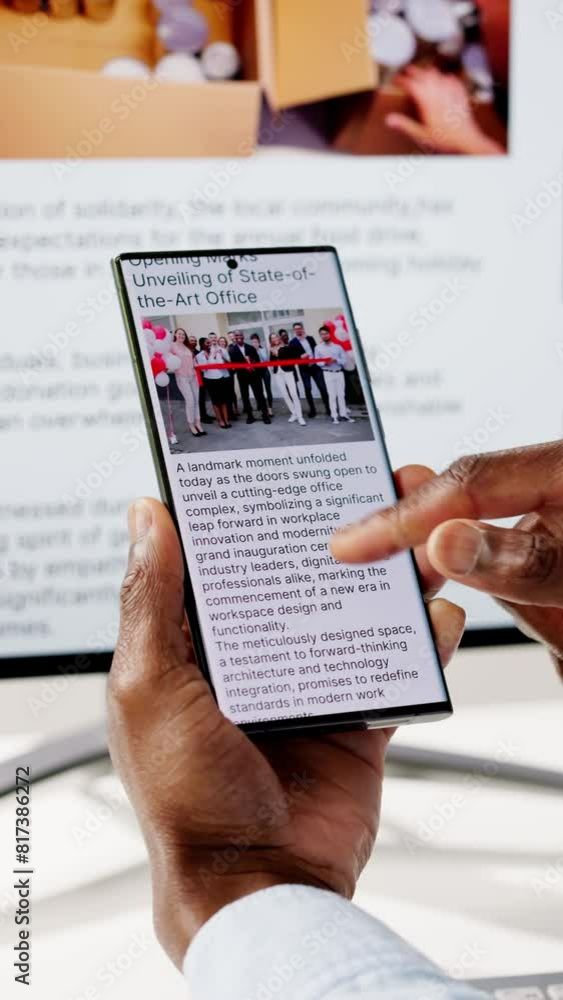 Watching Online News Article On Mobile Phone And Laptop Watching Online News Article On Mobile Phone And Laptop