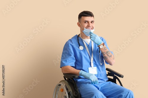 Young male doctor in wheelc...