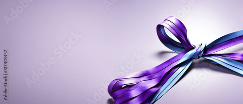 3D-rendered awareness ribbon in purple and blue hues with large copy space background
