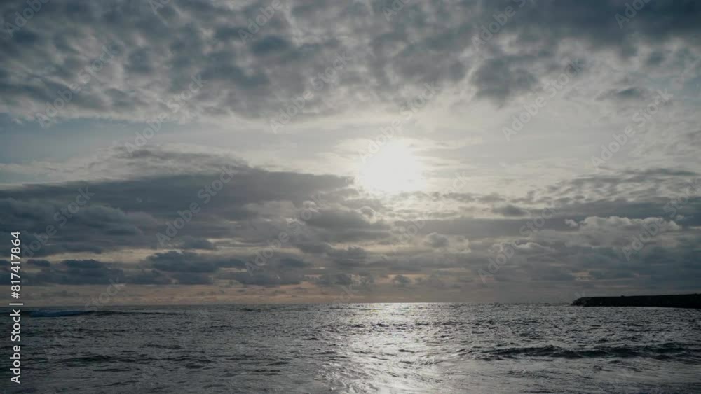 Sunset over the sea at Ovar, Portugal with cloudy sky Sunset over the sea at Ovar, Portugal with cloudy sky