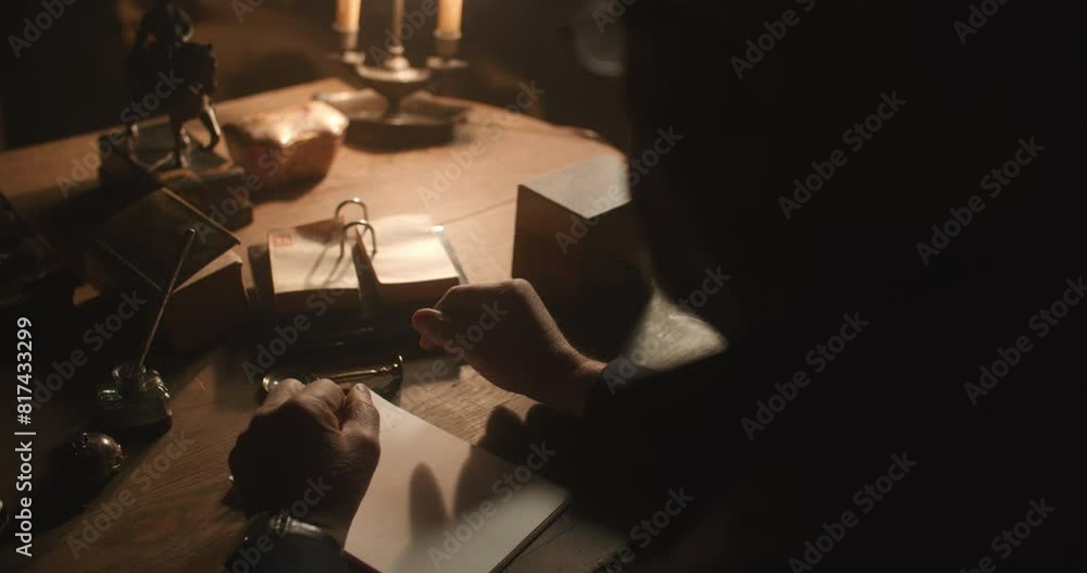 Elderly researcher studying an old book. Elderly researcher studying an old book.