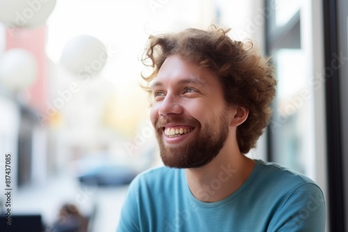 smiling man looking at someone photo