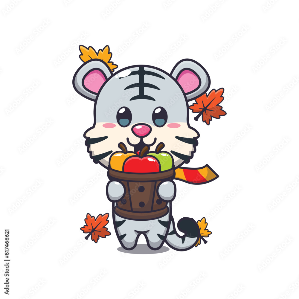 Obraz premium Cute white tiger holding a apple in wood bucket