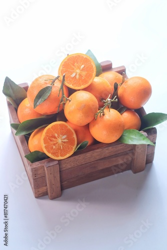 Jeruk santang madu ( citrus sinensis) . Often consumed during Chinese New Year, isolated on white background
 photo