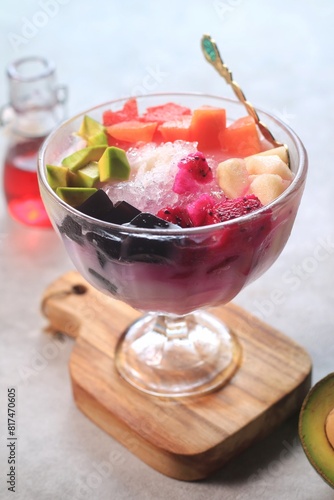 Es buah or sop buah-is an Indonesian iced fruit cocktail dessert. This cold and sweet beverage is made of diced fruits mixed with shaved ice or ice cubes, and sweetened with liquid sugar or syrup
