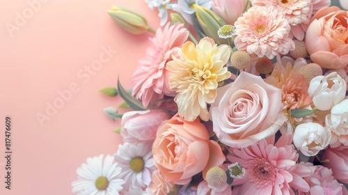 A beautiful floral arrangement featuring pastel-colored roses  tulips  and daisies with ample copy space on a soft pink background for text or graphics