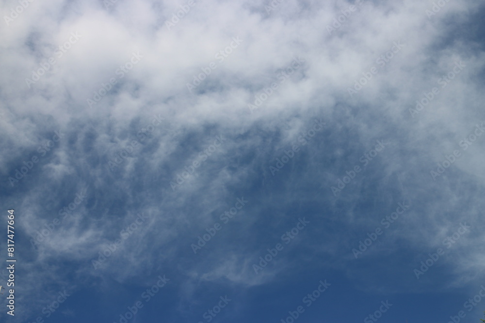 blue sky with white, soft clouds