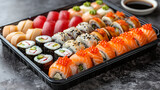 Side view mix sushi rolls on a tray with ginger and wasabi, on a wooden table japan.