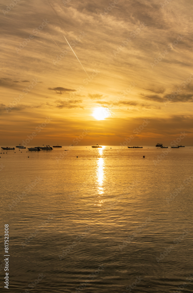 Fototapeta premium Beautiful red and orange sunrise over the sea.