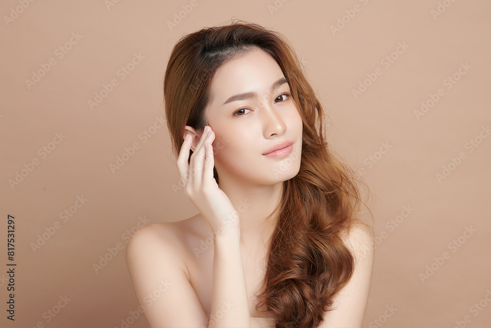 Beautiful young asian woman with clean fresh skin on beige background, Face care, Facial treatment, Cosmetology, beauty and spa, Asian women portrait. Beautiful young asian woman with clean fresh skin on beige background, Face care, Facial treatment, Cosmetology, beauty and spa, Asian women portrait.