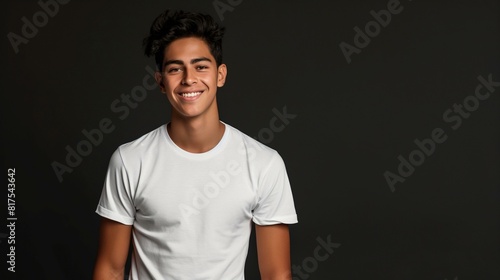 Happy Young Man Smiling in Blank White T-Shirt Against Dark Background © Generative ART