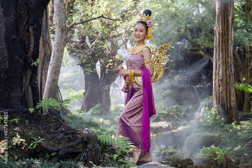 Lady in Thai literature. Beautiful girl in a Kinnari or Kinnaree dress in Himmapan forest   Kinnaree is an animal  The upper body is human and lower part is a bird with wings to fly.