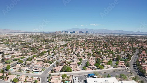 Aerial shot of Las Vegas suburb with strip city casino skyline in background 05