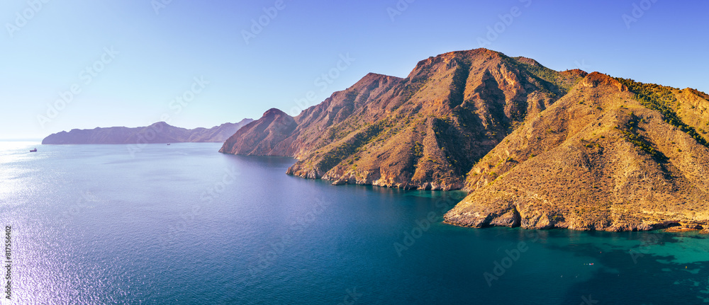 Panorama of the rock in the sea Aerial view. Cabo de Gata-Níjar reserve. El Portus, Almeria Andalusia Spain Horizontal banner