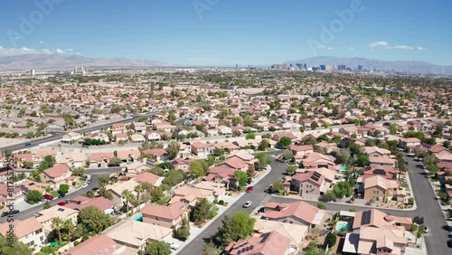 Aerial shot of Las Vegas suburb with strip city casino skyline in background 14