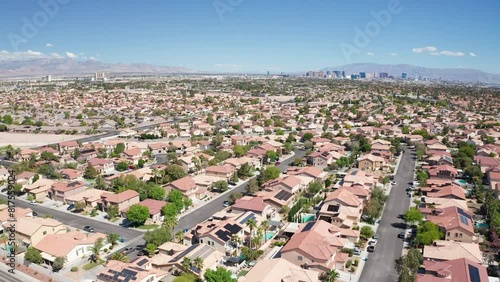 Aerial shot of Las Vegas suburb with strip city casino skyline in background 16
