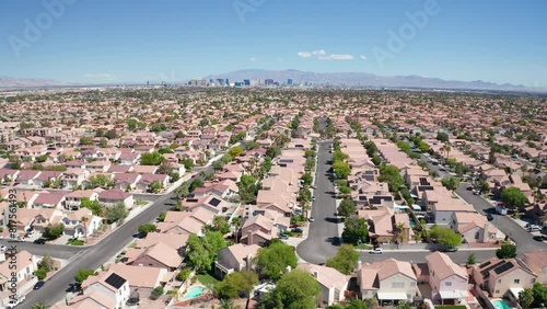 Aerial shot of Las Vegas suburb with strip city casino skyline in background 18