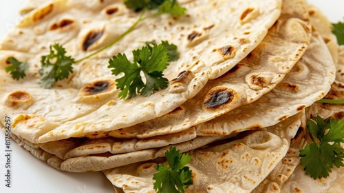 Chapati tortillas with fresh parsley are isolated in close up on a white background. AI Generative photo