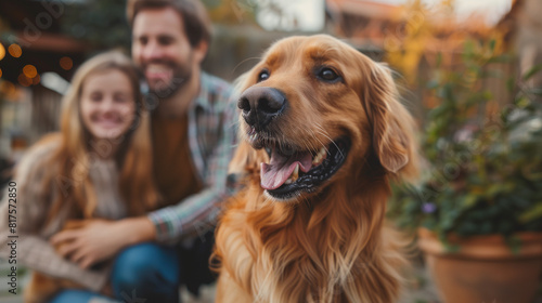happy family , father and daughter with a golden retriever on the park