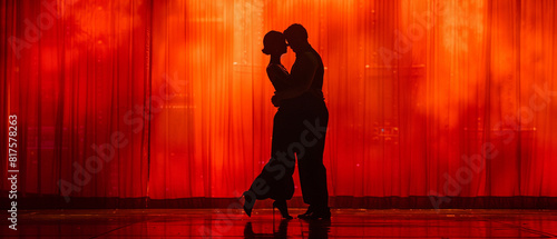 A couple performing a tango on a stage, close up, passionate theme, dynamic, silhouette, theater backdrop photo