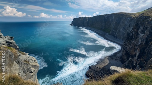 A stunning coastal scene, with rugged cliffs overlooking a deep blue ocean and waves crashing against the shore. 32k, full ultra HD, high resolution