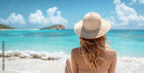 Pretty Woman Wearing Straw Hat, Sitting On The Sand Tropical Beach