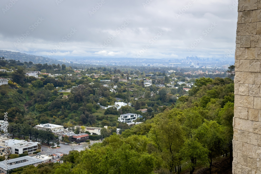 Fototapeta premium Cityscape Beverly Hills and Los Angeles, California, USA against cloudy sky in springtime